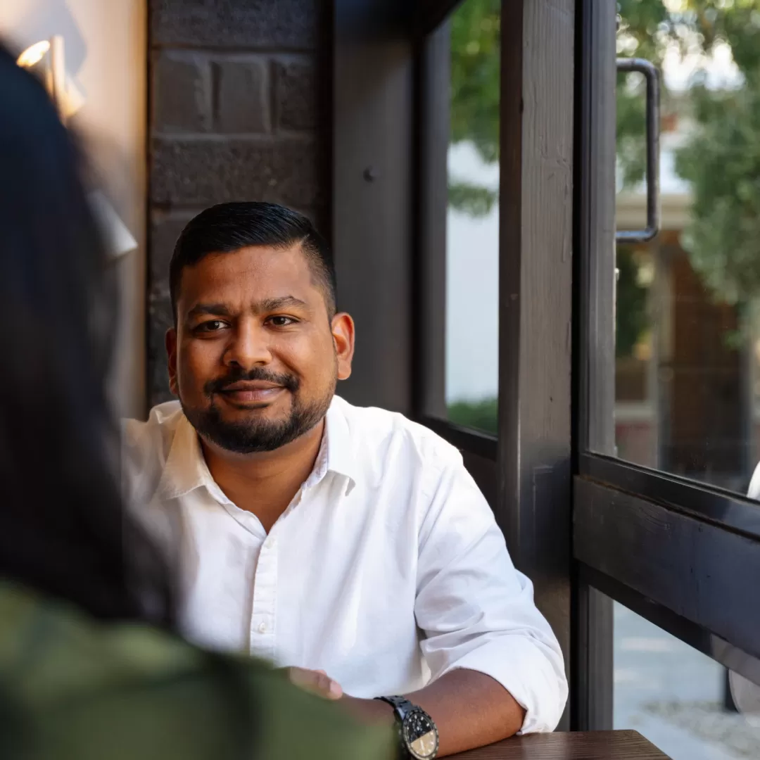 Provida Lend mortgage broker meeting with migrant clients to discuss home loan options in Australia